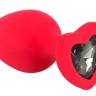Красная силиконовая анальная пробка с черным стразом-сердечком - 7,9 см.