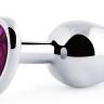 Серебристая анальная пробка с фиолетовым кристаллом-сердечком - 8 см.